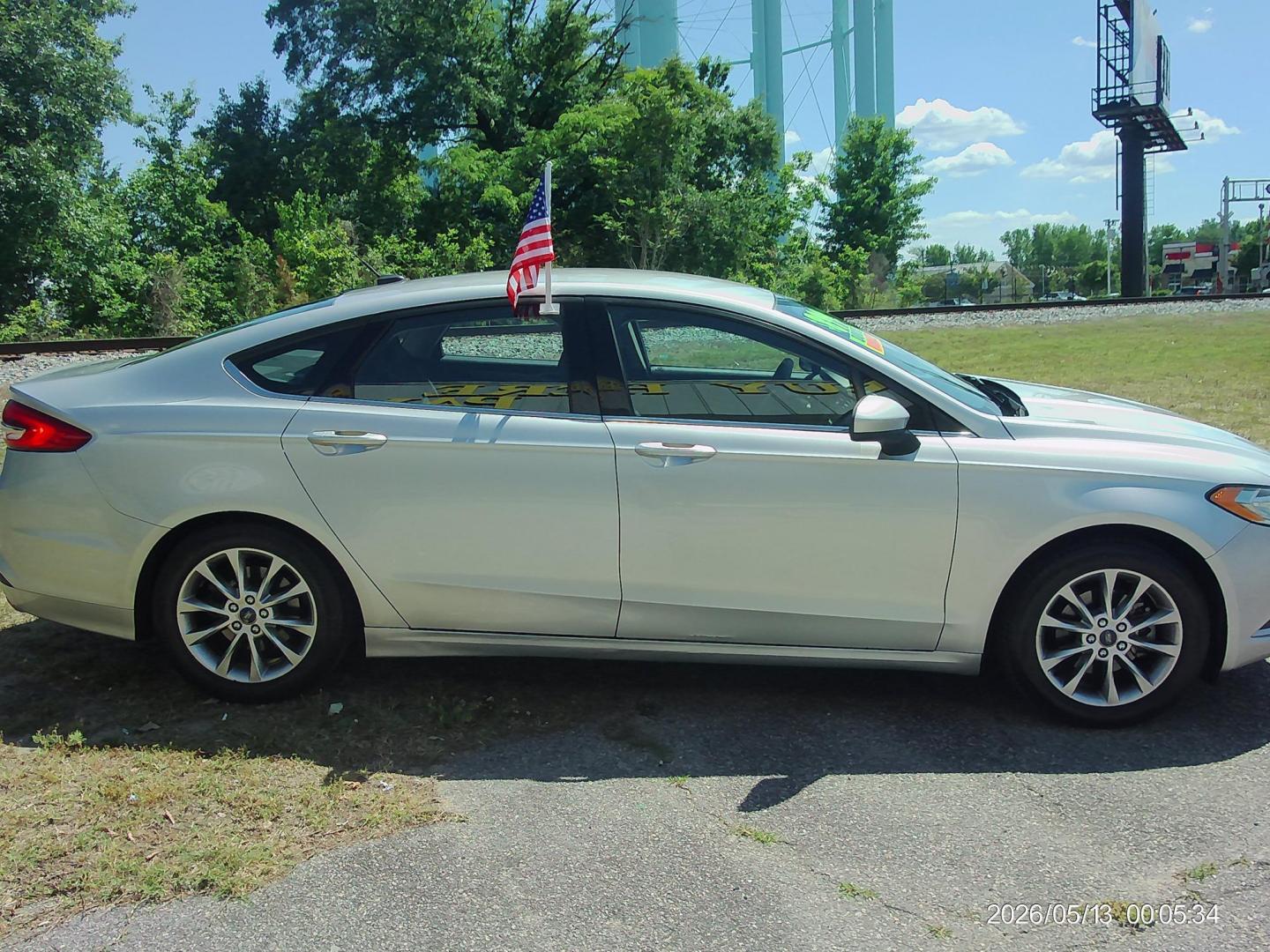 2017 Silver Ford Fusion SE (3FA6P0HD5HR) with an 1.5L L4 DOHC 16V engine, 6A transmission, located at 2553 Airline Blvd, Portsmouth, VA, 23701, (757) 488-8331, 36.813889, -76.357597 - ***VEHICLE TERMS*** Down Payment: $899 Weekly Payment: $115 APR: 23.9% Repayment Terms: 42 Months *** CALL ELIZABETH SMITH - DIRECTOR OF MARKETING @ 757-488-8331 TO SCHEDULE YOUR APPOINTMENT TODAY AND GET PRE-APPROVED RIGHT OVER THE PHONE*** - Photo#4