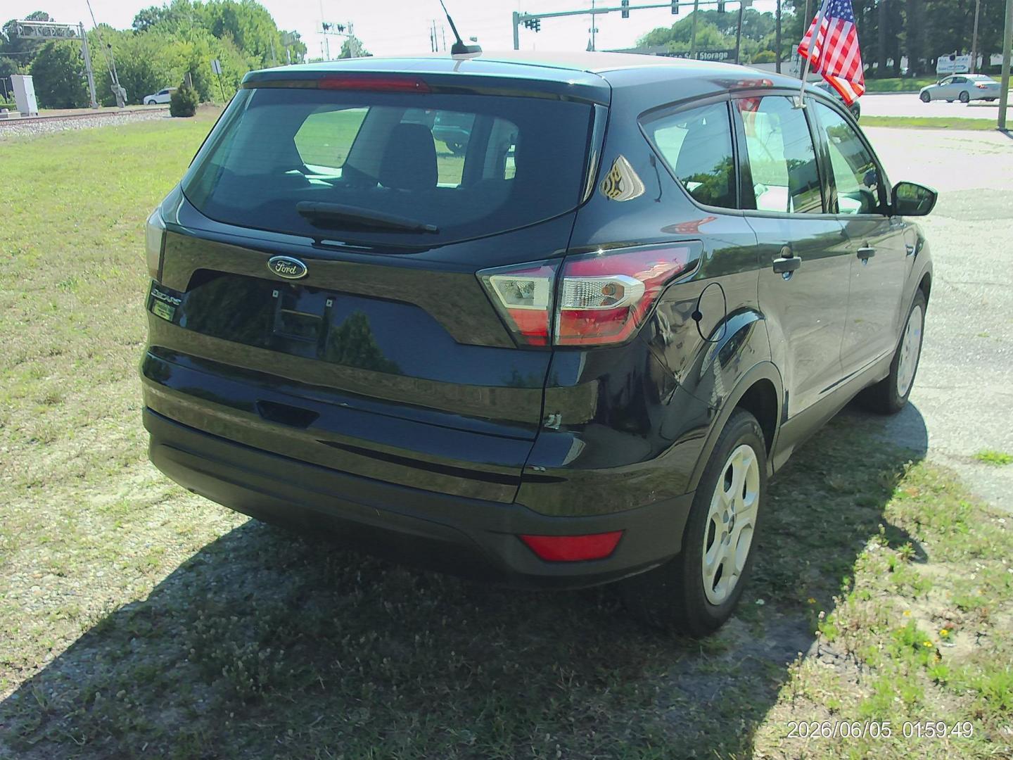 2017 Black Ford Escape S FWD (1FMCU0F71HU) with an 2.5L L4 DOHC 16V engine, 6A transmission, located at 2553 Airline Blvd, Portsmouth, VA, 23701, (757) 488-8331, 36.813889, -76.357597 - ***VEHICLE TERMS*** Down Payment: $999 Weekly Payment: $120 APR: 23.9% Repayment Terms: 42 Months *** CALL ELIZABETH SMITH - DIRECTOR OF MARKETING @ 757-488-8331 TO SCHEDULE YOUR APPOINTMENT TODAY AND GET PRE-APPROVED RIGHT OVER THE PHONE*** - Photo#5