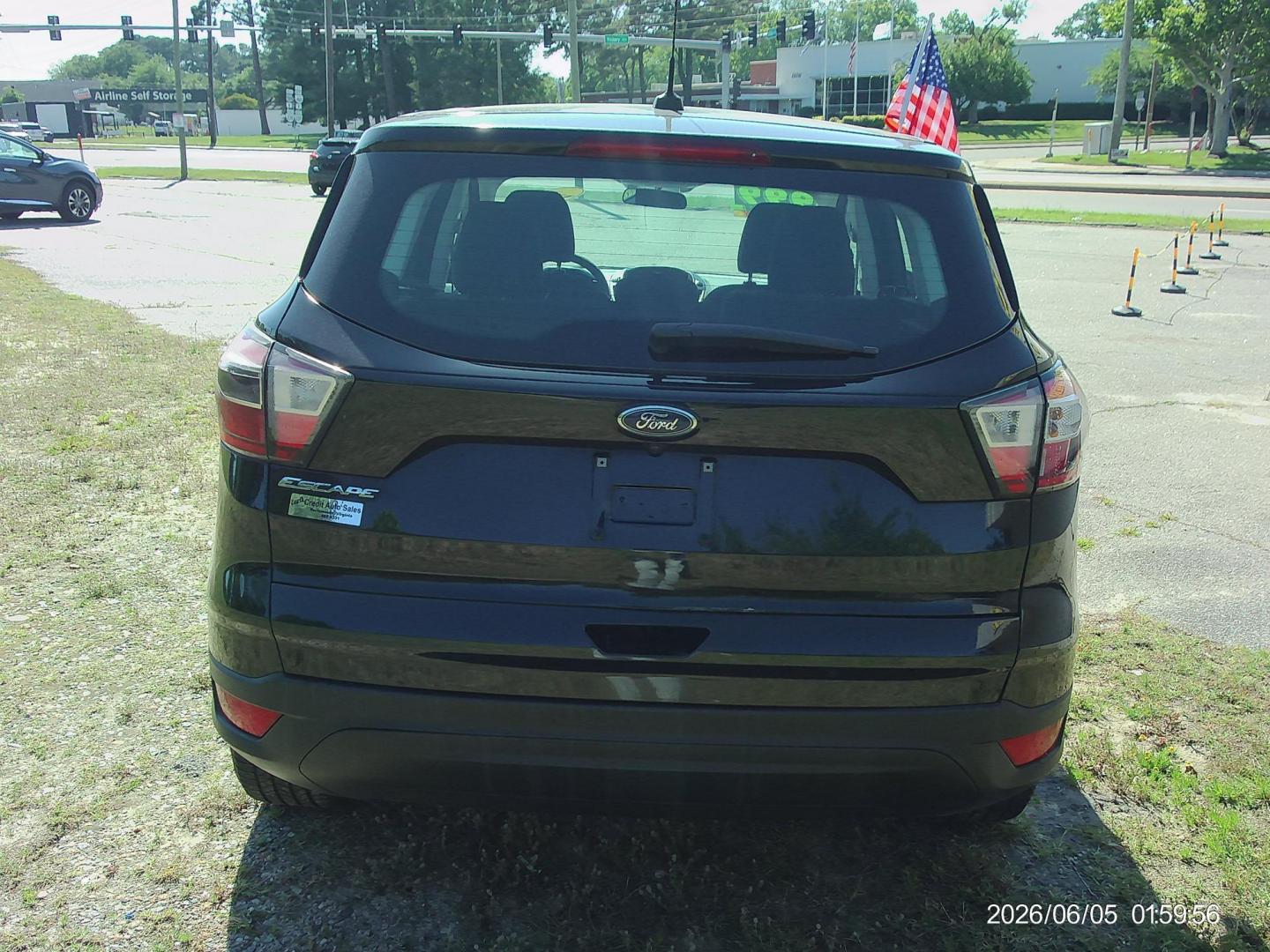 2017 Black Ford Escape S FWD (1FMCU0F71HU) with an 2.5L L4 DOHC 16V engine, 6A transmission, located at 2553 Airline Blvd, Portsmouth, VA, 23701, (757) 488-8331, 36.813889, -76.357597 - ***VEHICLE TERMS*** Down Payment: $999 Weekly Payment: $120 APR: 23.9% Repayment Terms: 42 Months *** CALL ELIZABETH SMITH - DIRECTOR OF MARKETING @ 757-488-8331 TO SCHEDULE YOUR APPOINTMENT TODAY AND GET PRE-APPROVED RIGHT OVER THE PHONE*** - Photo#6