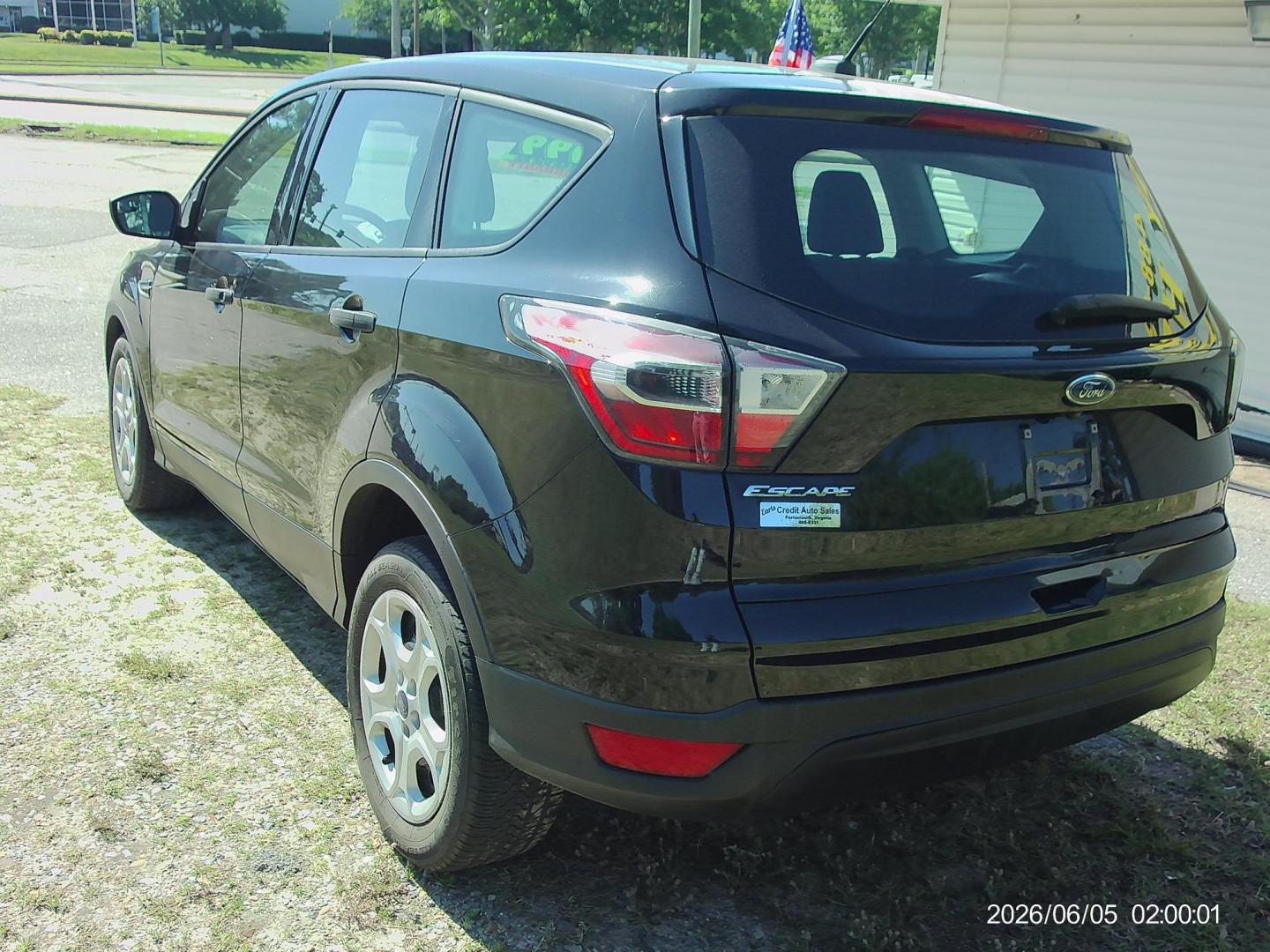 2017 Black Ford Escape S FWD (1FMCU0F71HU) with an 2.5L L4 DOHC 16V engine, 6A transmission, located at 2553 Airline Blvd, Portsmouth, VA, 23701, (757) 488-8331, 36.813889, -76.357597 - ***VEHICLE TERMS*** Down Payment: $999 Weekly Payment: $120 APR: 23.9% Repayment Terms: 42 Months *** CALL ELIZABETH SMITH - DIRECTOR OF MARKETING @ 757-488-8331 TO SCHEDULE YOUR APPOINTMENT TODAY AND GET PRE-APPROVED RIGHT OVER THE PHONE*** - Photo#7