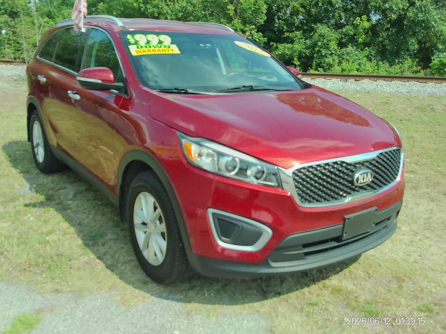 2017 Red Kia Sorento L 2WD (5XYPG4A35HG) with an 2.4L L4 DOHC 16V engine, 6A transmission, located at 2553 Airline Blvd, Portsmouth, VA, 23701, (757) 488-8331, 36.813889, -76.357597 - ***VEHICLE TERMS*** Down Payment: $999 Weekly Payment: $115 APR: 23.9% Repayment Terms: 42 Months *** CALL ELIZABETH SMITH - DIRECTOR OF MARKETING @ 757-488-8331 TO SCHEDULE YOUR APPOINTMENT TODAY AND GET PRE-APPROVED RIGHT OVER THE PHONE*** - Photo#3