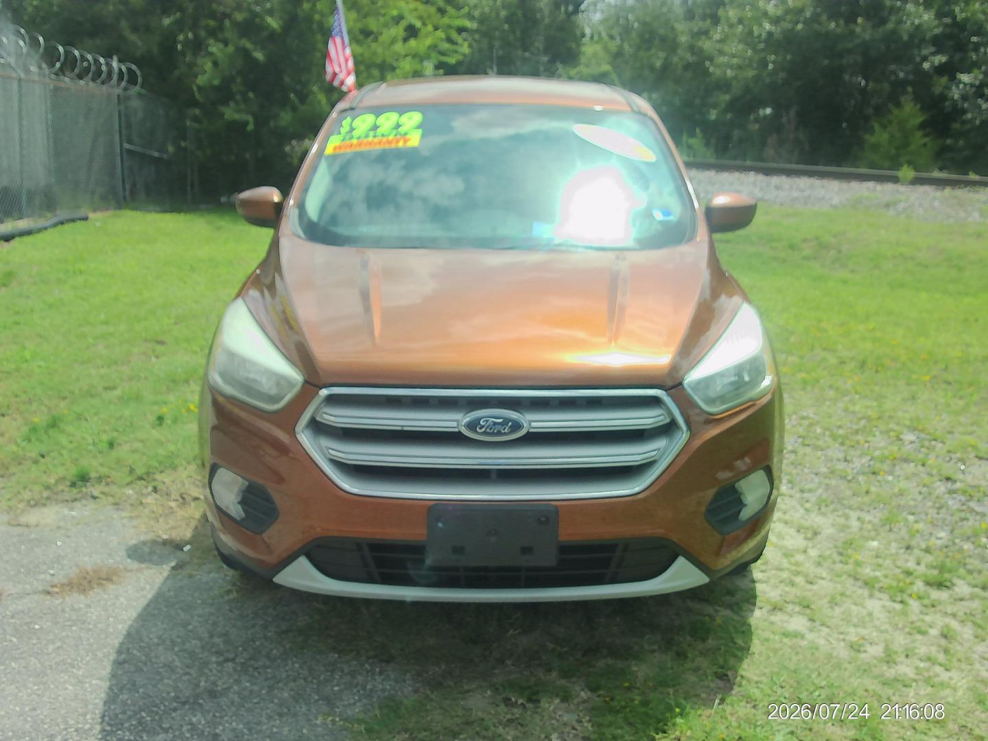 2017 Orange Ford Escape SE 4WD (1FMCU9G93HU) with an 2.0L L4 DOHC 16V engine, 6A transmission, located at 2553 Airline Blvd, Portsmouth, VA, 23701, (757) 488-8331, 36.813889, -76.357597 - ***VEHICLE TERMS*** Down Payment: $999 Weekly Payment: $115 APR: 23.9% Repayment Terms: 42 Months *** CALL ELIZABETH SMITH - DIRECTOR OF MARKETING @ 757-488-8331 TO SCHEDULE YOUR APPOINTMENT TODAY AND GET PRE-APPROVED RIGHT OVER THE PHONE***- Photo#2