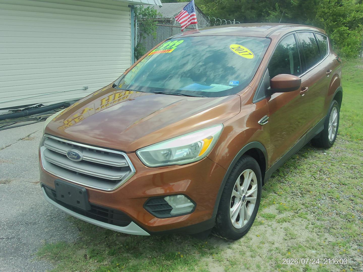 2017 Orange Ford Escape SE 4WD (1FMCU9G93HU) with an 2.0L L4 DOHC 16V engine, 6A transmission, located at 2553 Airline Blvd, Portsmouth, VA, 23701, (757) 488-8331, 36.813889, -76.357597 - ***VEHICLE TERMS*** Down Payment: $999 Weekly Payment: $115 APR: 23.9% Repayment Terms: 42 Months *** CALL ELIZABETH SMITH - DIRECTOR OF MARKETING @ 757-488-8331 TO SCHEDULE YOUR APPOINTMENT TODAY AND GET PRE-APPROVED RIGHT OVER THE PHONE***- Photo#1