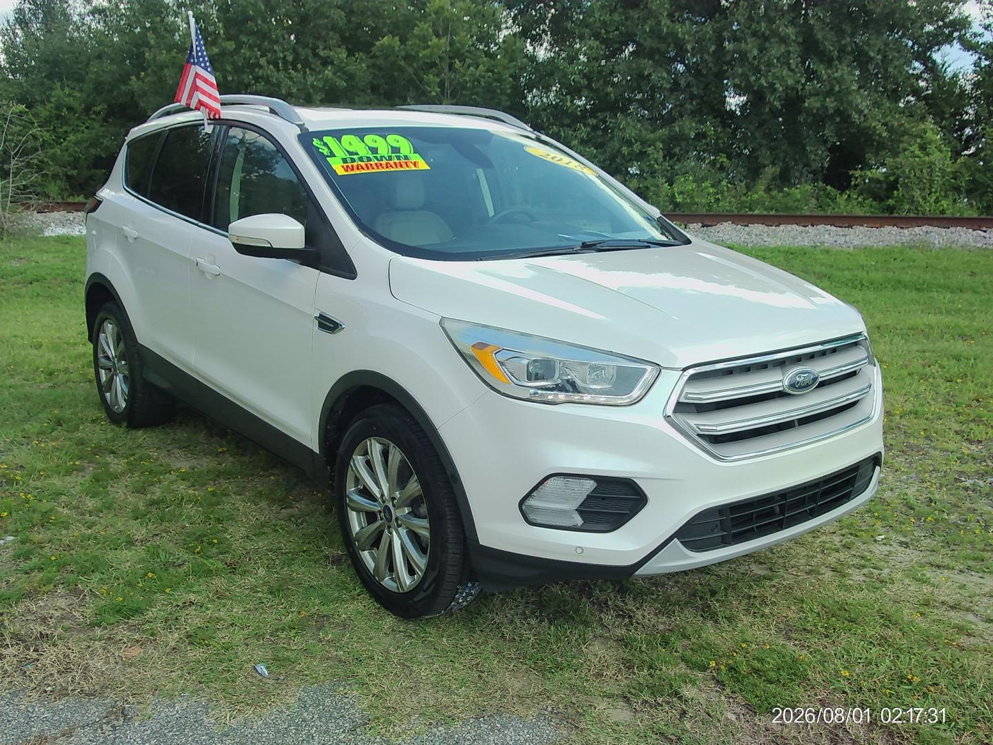 2018 White Ford Escape Titanium FWD (1FMCU0J90JU) with an 2.0L L4 DOHC 16V engine, 6A transmission, located at 2553 Airline Blvd, Portsmouth, VA, 23701, (757) 488-8331, 36.813889, -76.357597 - ***VEHICLE TERMS*** Down Payment: $1499 Weekly Payment: $125 APR: 23.9% Repayment Terms: 42 Months *** CALL ELIZABETH SMITH - DIRECTOR OF MARKETING @ 757-488-8331 TO SCHEDULE YOUR APPOINTMENT TODAY AND GET PRE-APPROVED RIGHT OVER THE PHONE***- Photo#3