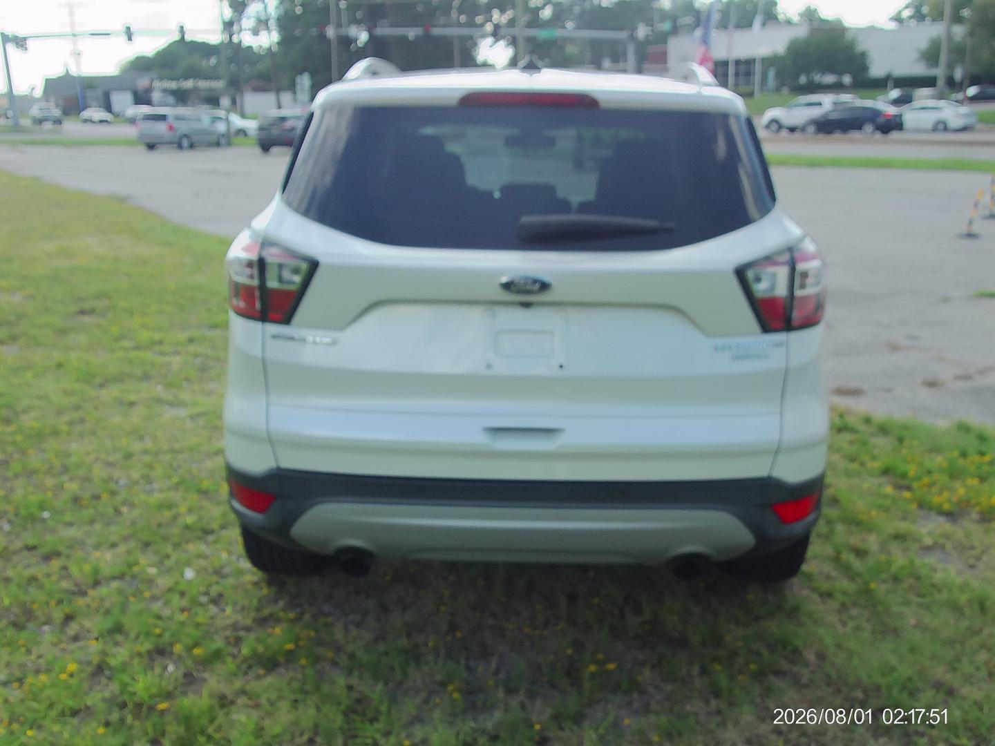2018 White Ford Escape Titanium FWD (1FMCU0J90JU) with an 2.0L L4 DOHC 16V engine, 6A transmission, located at 2553 Airline Blvd, Portsmouth, VA, 23701, (757) 488-8331, 36.813889, -76.357597 - ***VEHICLE TERMS*** Down Payment: $1499 Weekly Payment: $125 APR: 23.9% Repayment Terms: 42 Months *** CALL ELIZABETH SMITH - DIRECTOR OF MARKETING @ 757-488-8331 TO SCHEDULE YOUR APPOINTMENT TODAY AND GET PRE-APPROVED RIGHT OVER THE PHONE***- Photo#6