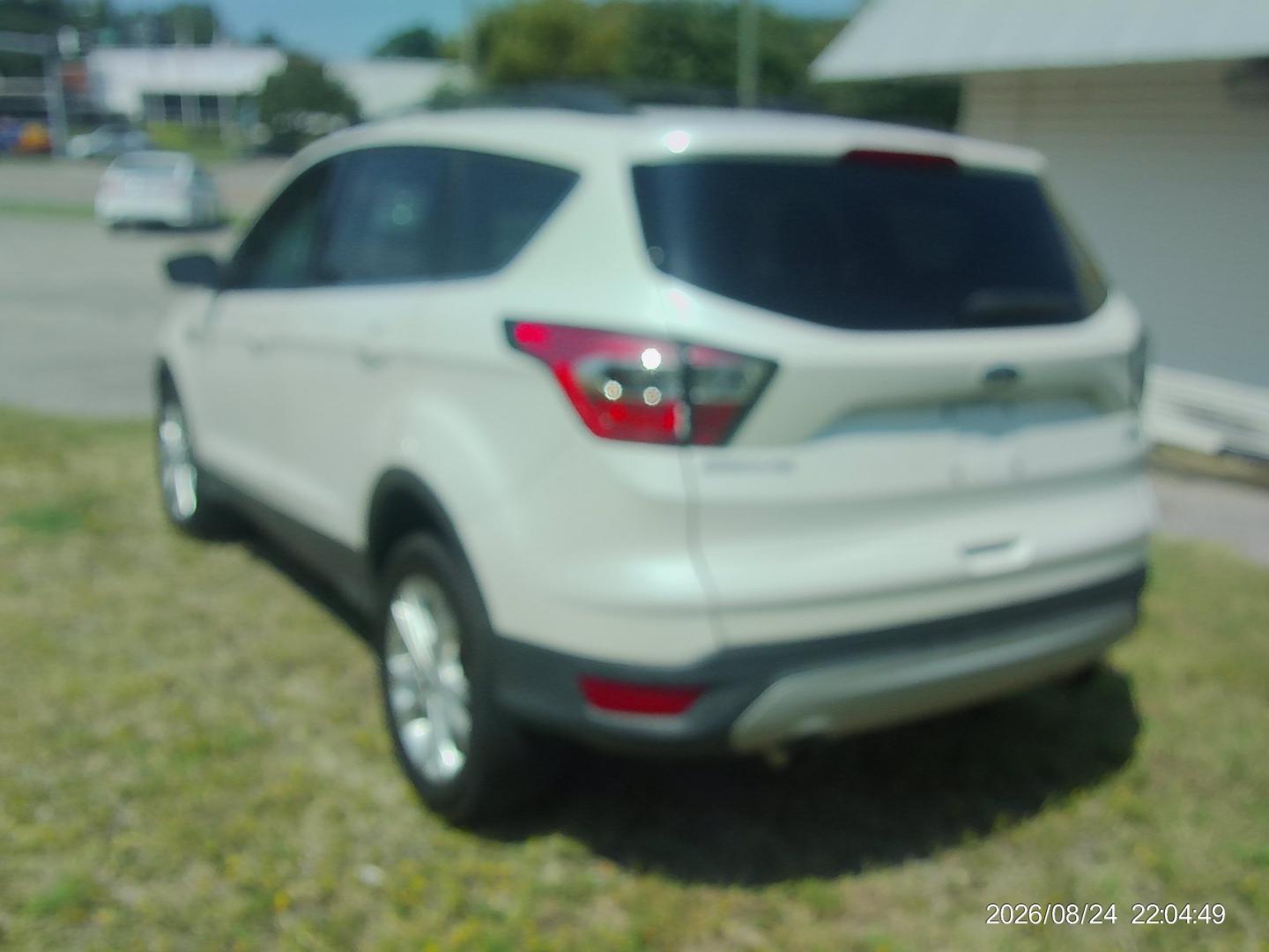 2017 White Ford Escape SE 4WD (1FMCU9GD8HU) with an 1.5L L4 DOHC 16V engine, 6A transmission, located at 2553 Airline Blvd, Portsmouth, VA, 23701, (757) 488-8331, 36.813889, -76.357597- Photo#7