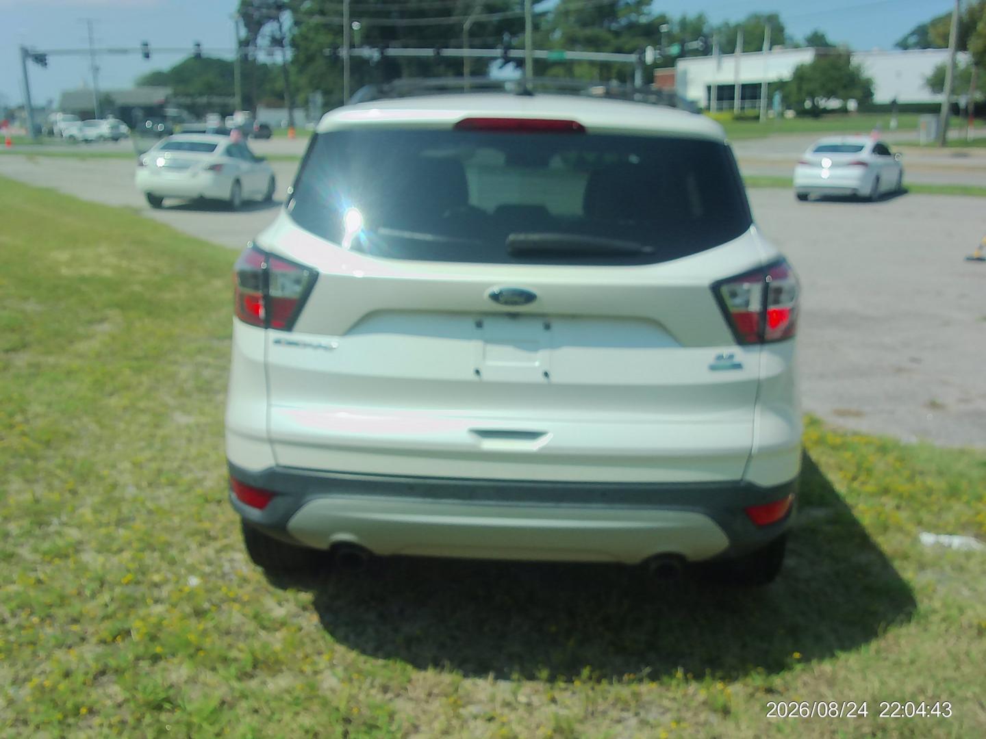 2017 White Ford Escape SE 4WD (1FMCU9GD8HU) with an 1.5L L4 DOHC 16V engine, 6A transmission, located at 2553 Airline Blvd, Portsmouth, VA, 23701, (757) 488-8331, 36.813889, -76.357597- Photo#6