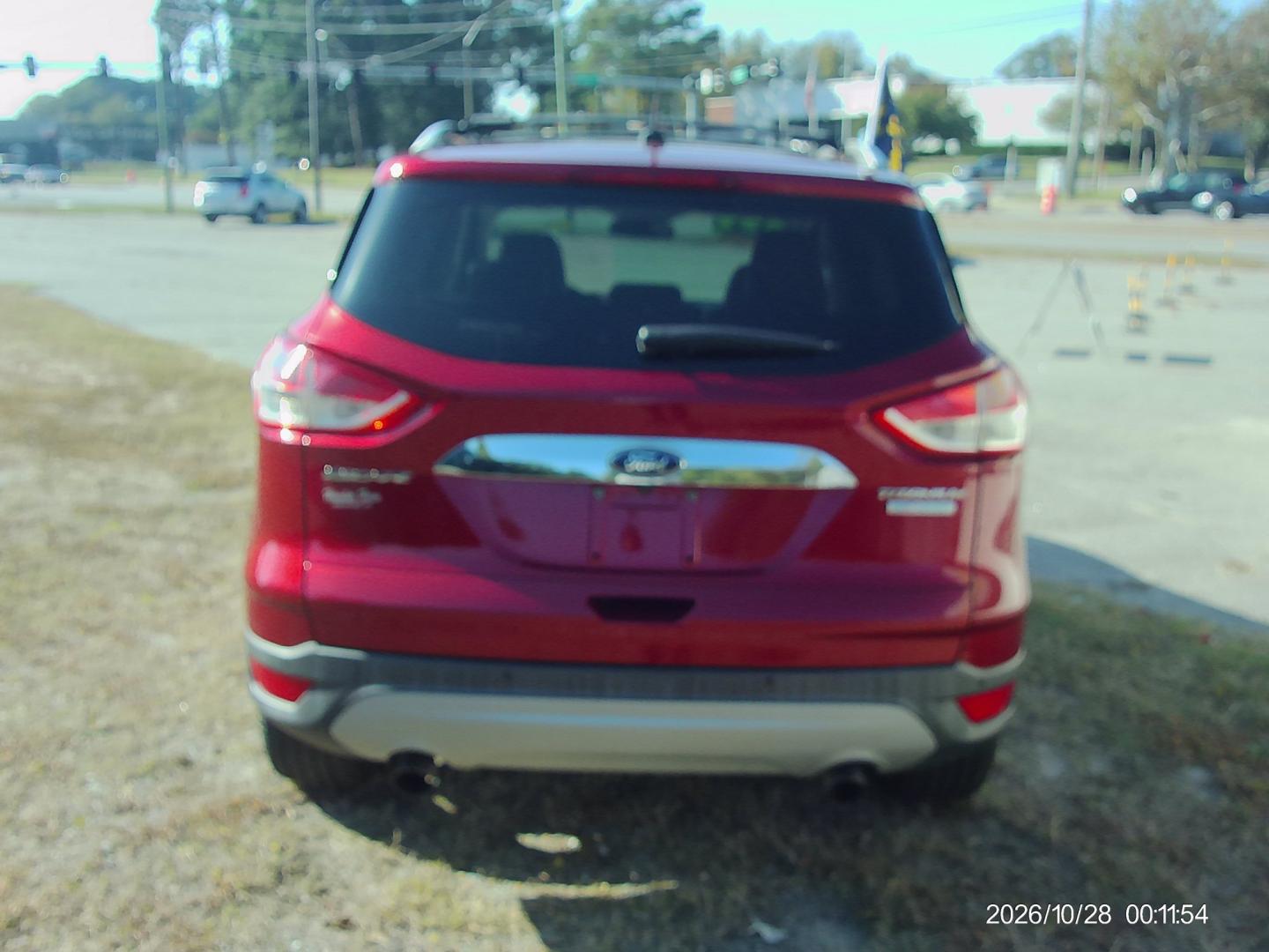 2016 Red Ford Escape Titanium FWD (1FMCU0J95GU) with an 2.0L L4 DOHC 16V engine, 6A transmission, located at 2553 Airline Blvd, Portsmouth, VA, 23701, (757) 488-8331, 36.813889, -76.357597 - ***VEHICLE TERMS*** Down Payment: $899 Weekly Payment: $115 APR: 23.9% Repayment Terms: 42 Months *** CALL ELIZABETH SMITH - DIRECTOR OF MARKETING @ 757-488-8331 TO SCHEDULE YOUR APPOINTMENT TODAY AND GET PRE-APPROVED RIGHT OVER THE PHONE***- Photo#6