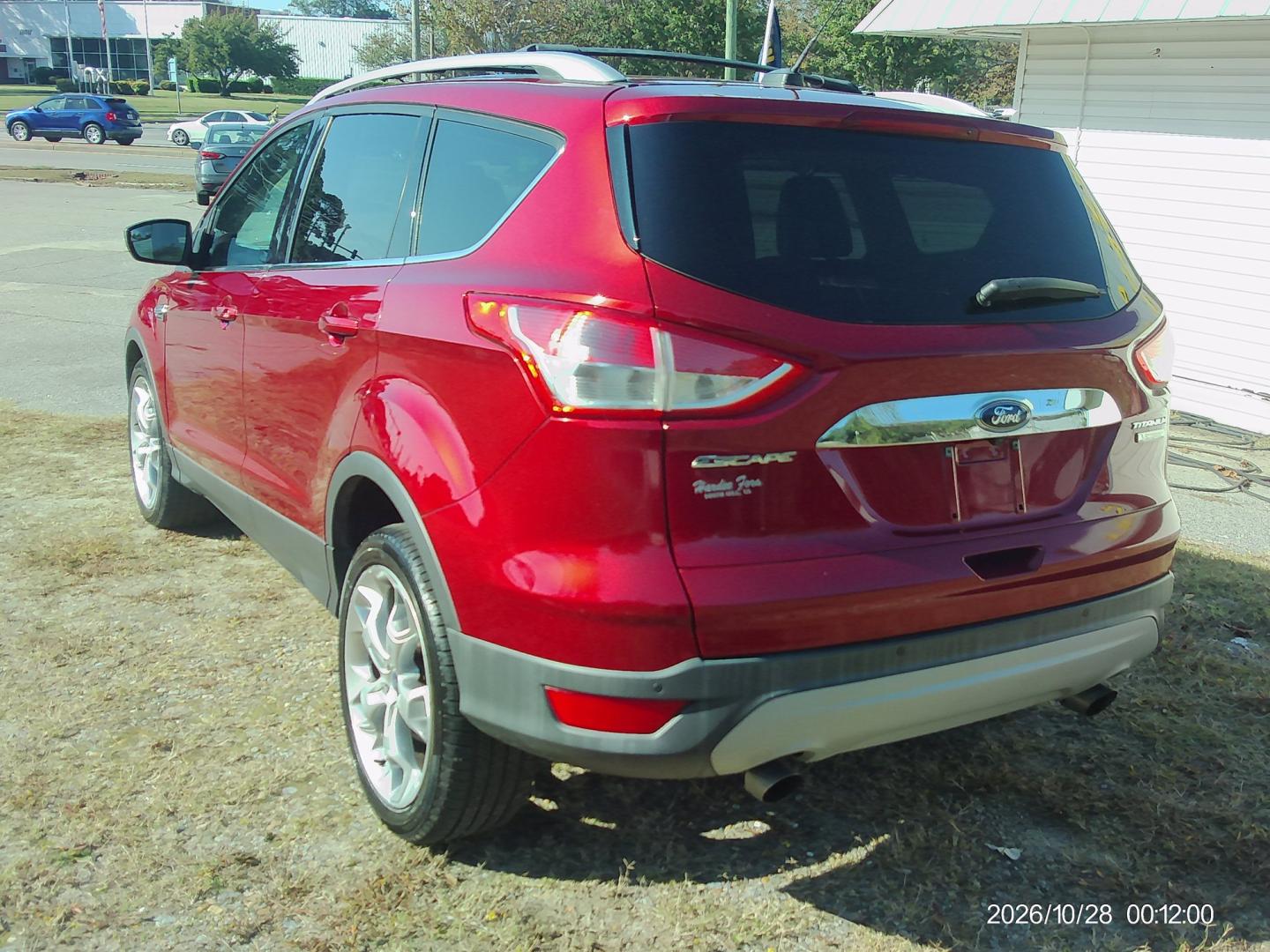 2016 Red Ford Escape Titanium FWD (1FMCU0J95GU) with an 2.0L L4 DOHC 16V engine, 6A transmission, located at 2553 Airline Blvd, Portsmouth, VA, 23701, (757) 488-8331, 36.813889, -76.357597 - ***VEHICLE TERMS*** Down Payment: $899 Weekly Payment: $115 APR: 23.9% Repayment Terms: 42 Months *** CALL ELIZABETH SMITH - DIRECTOR OF MARKETING @ 757-488-8331 TO SCHEDULE YOUR APPOINTMENT TODAY AND GET PRE-APPROVED RIGHT OVER THE PHONE***- Photo#7